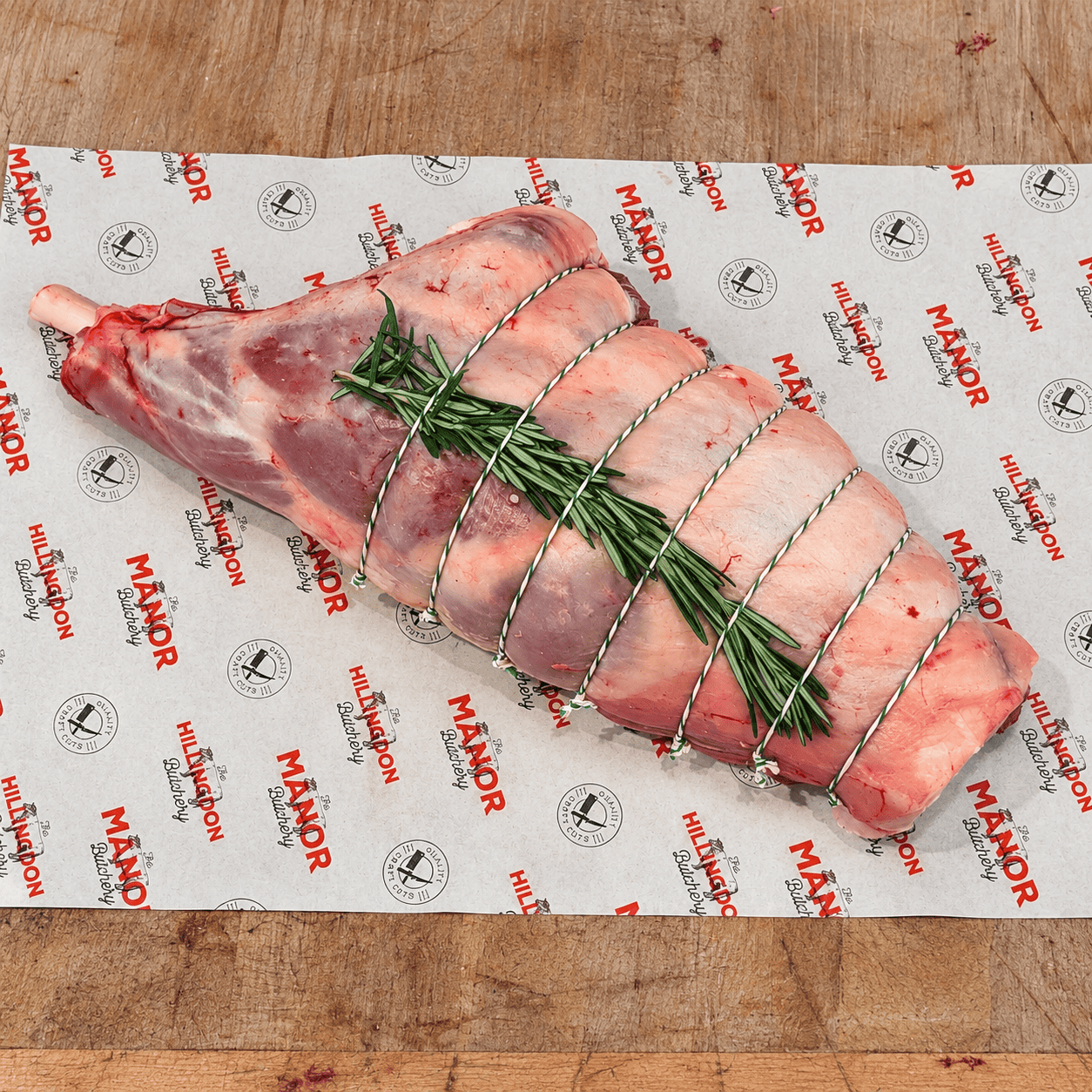 Butcher-prepared carvery leg of lamb hand-tied with rosemary