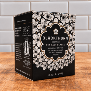 Blackthorn Scottish Sea Salt Flakes 240g on a wooden butcher’s block